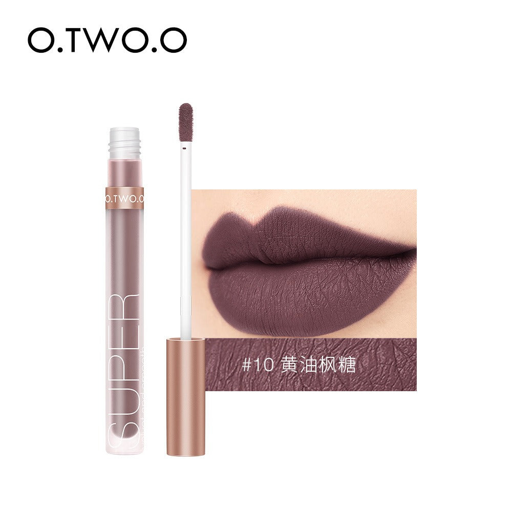 O.TWO.O matte liquid lipstick in shade #10, displayed with its wand and swatch on lips.