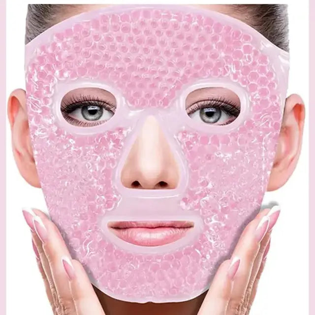 Pink gel bead face mask on a woman, featuring cutouts for eyes, nose, and mouth.