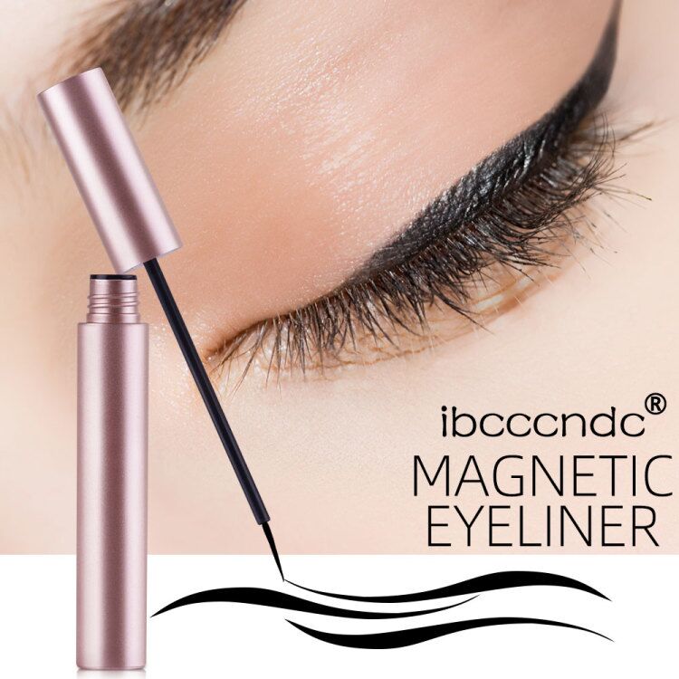 Metallic rose gold magnetic eyeliner tube with brush, shown against an eye with black liner and text.