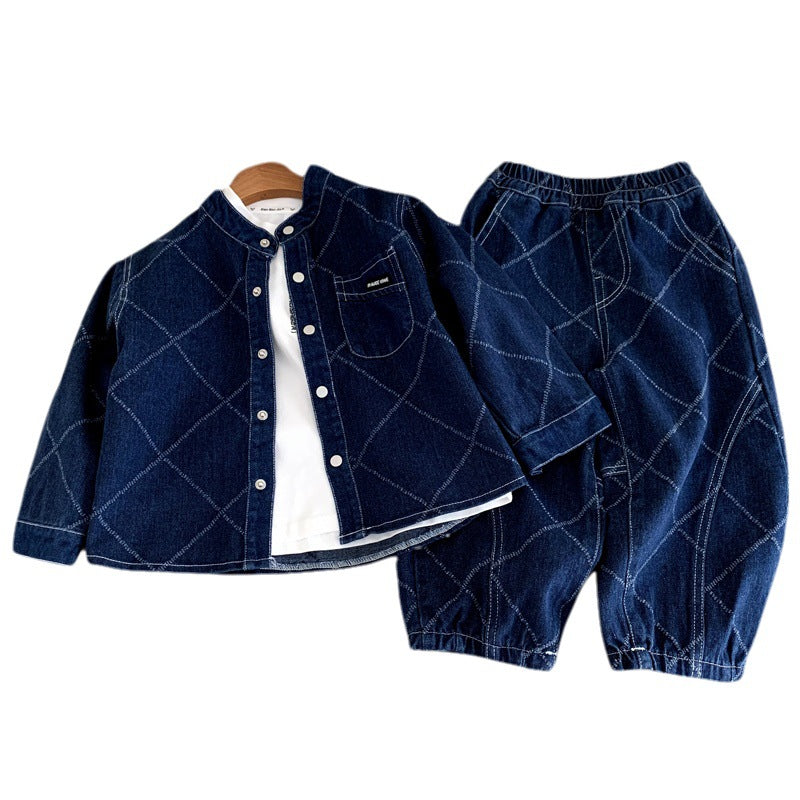 Dark blue denim children's outfit featuring quilted diamond pattern, snap buttons, jacket and elastic-waist pants.