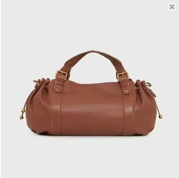 Brown leather duffel bag with dual top handles, side drawstrings, and gold-tone hardware buckles.