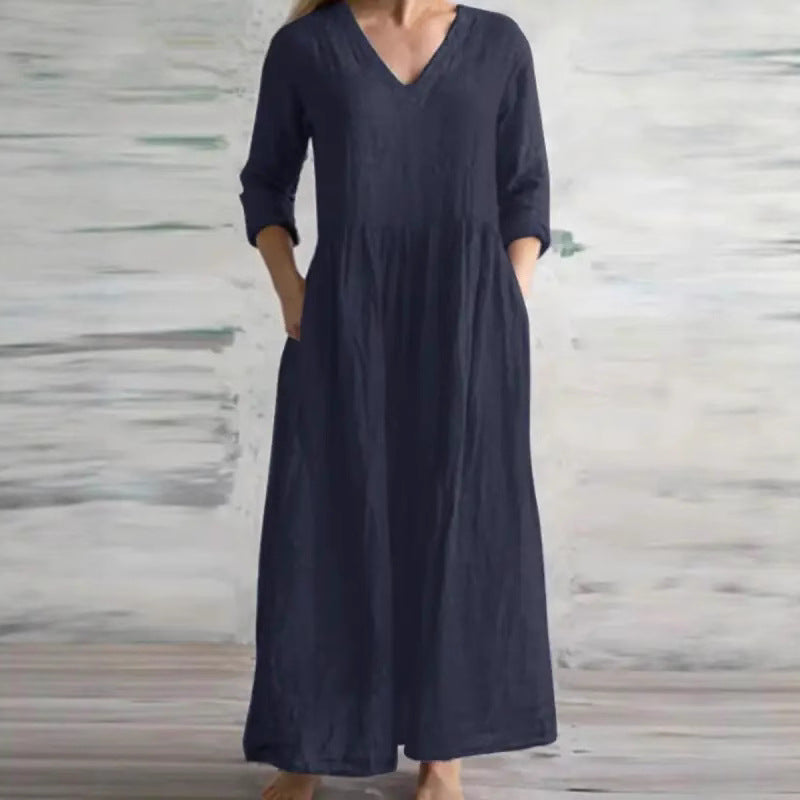 Eprolo v-neck loose-fitting long skirt with flowing fabric and a relaxed silhouette, suitable for casual or elegant wear.