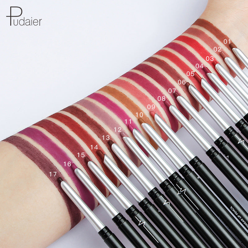 Seventeen numbered matte lip liner pencils in black and silver, with corresponding shades swatched on an arm.