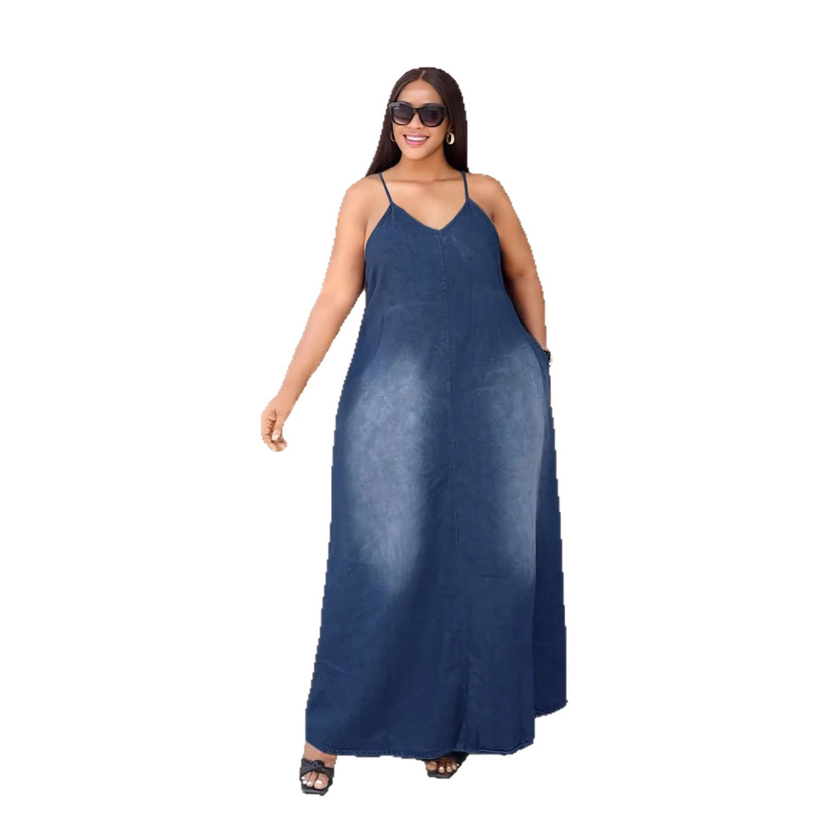 Casual faded denim dress with side pockets and loose straps, featuring a relaxed fit, by eprolo.