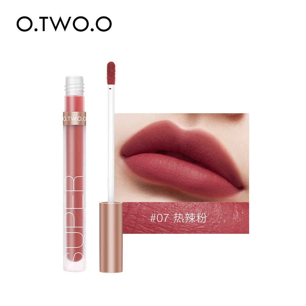 O.TWO.O liquid lipstick in shade #07, in a matte pink color, shown with applicator and lips wearing the shade.