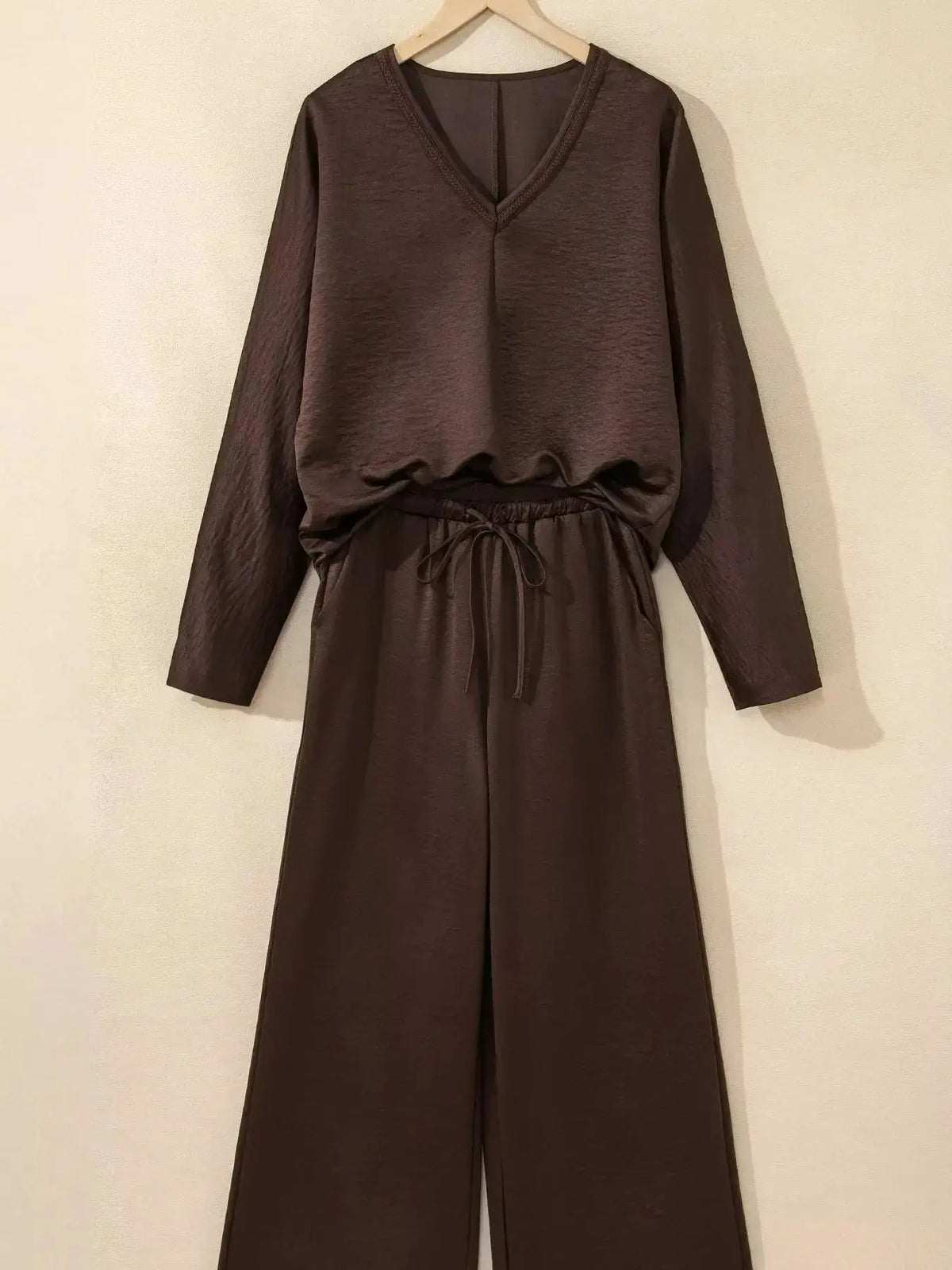 Plush Fashion Hub braided V-neck long sleeve top with high-waist pants lounge set, stylish and comfortable casual wear.