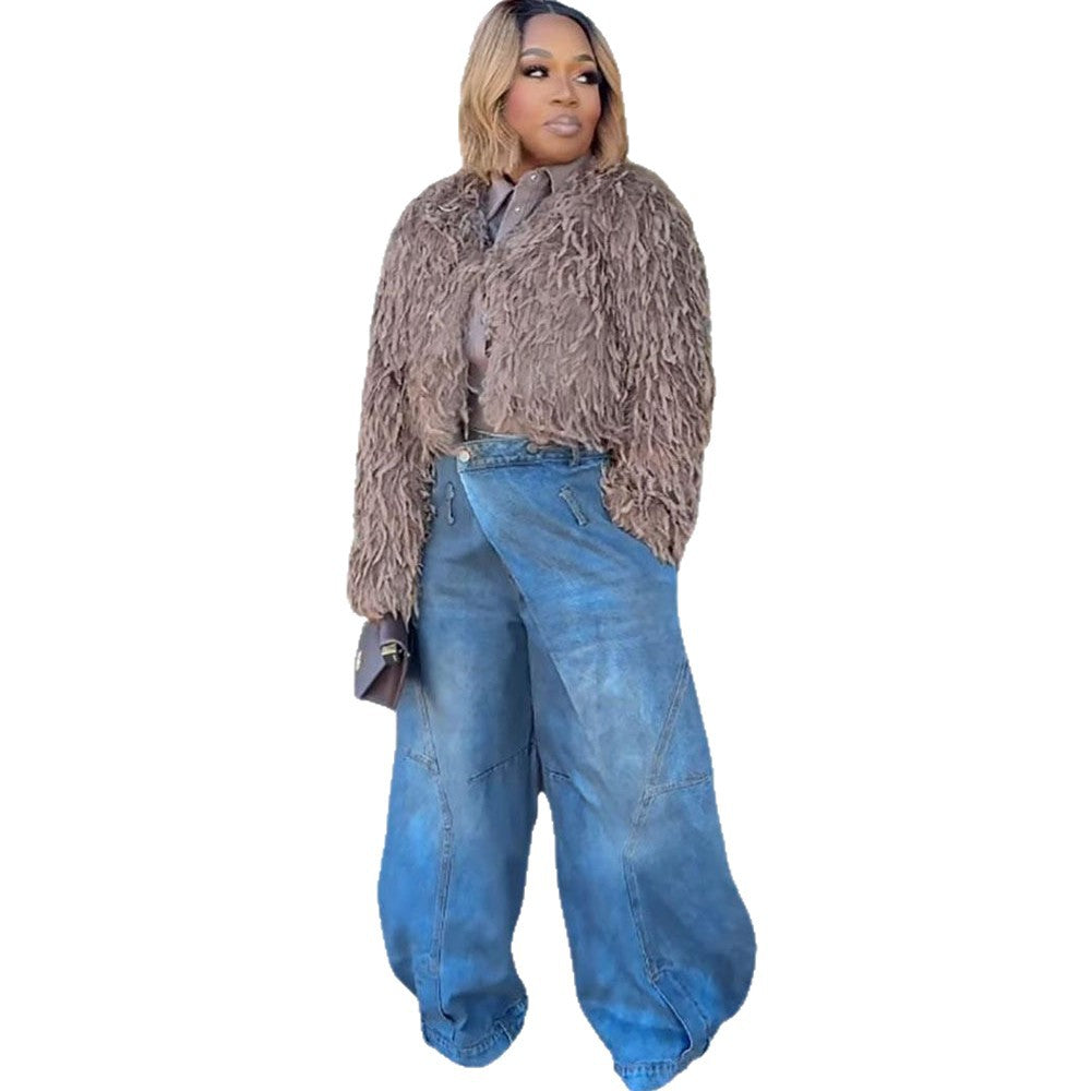 Women's vintage distressed washed wide-leg denim jeans by Plush Fashion Hub, showcasing relaxed fit and faded denim texture.