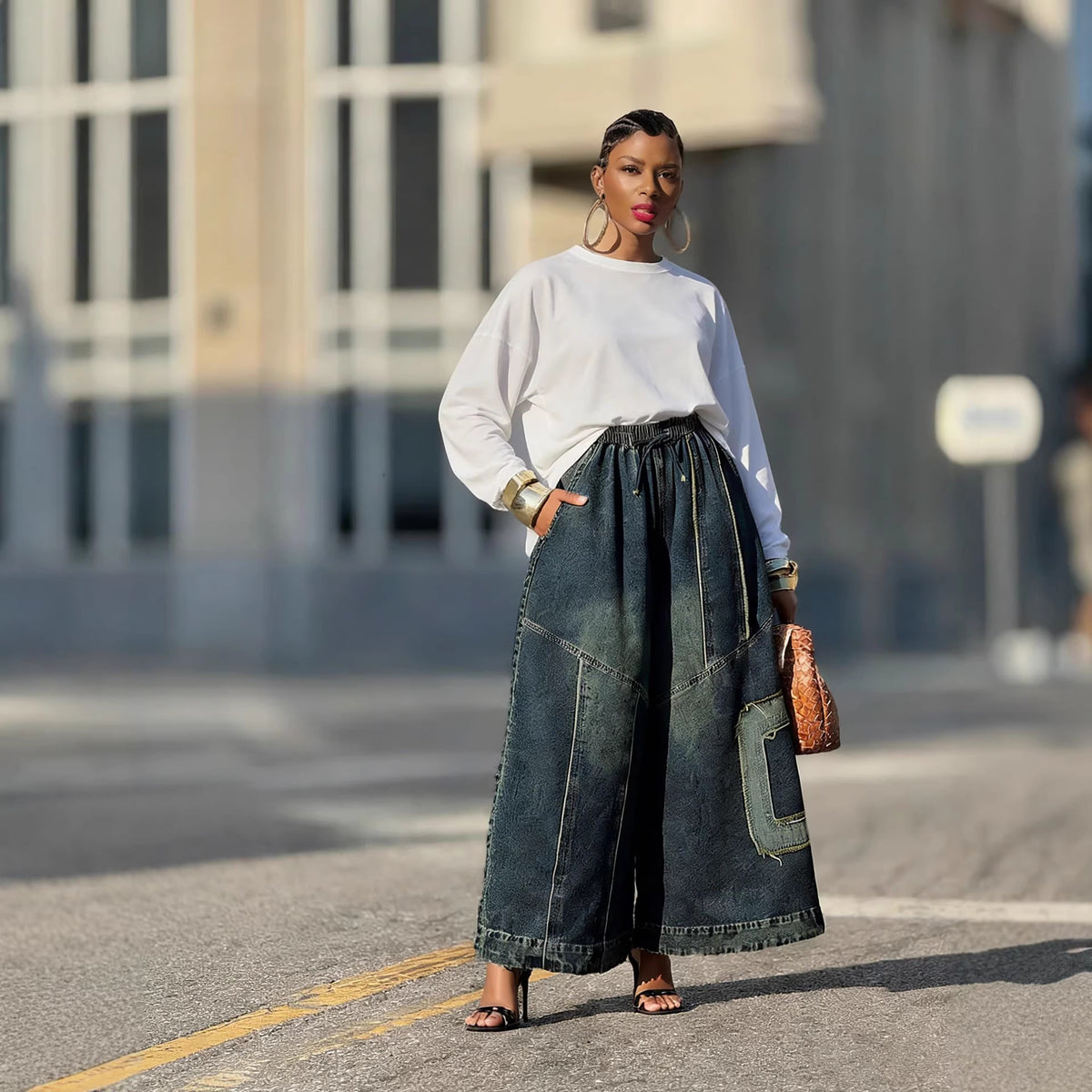 Vintage patchwork distressed wide-leg jeans by eprolo featuring elastic waistband and faded denim details.