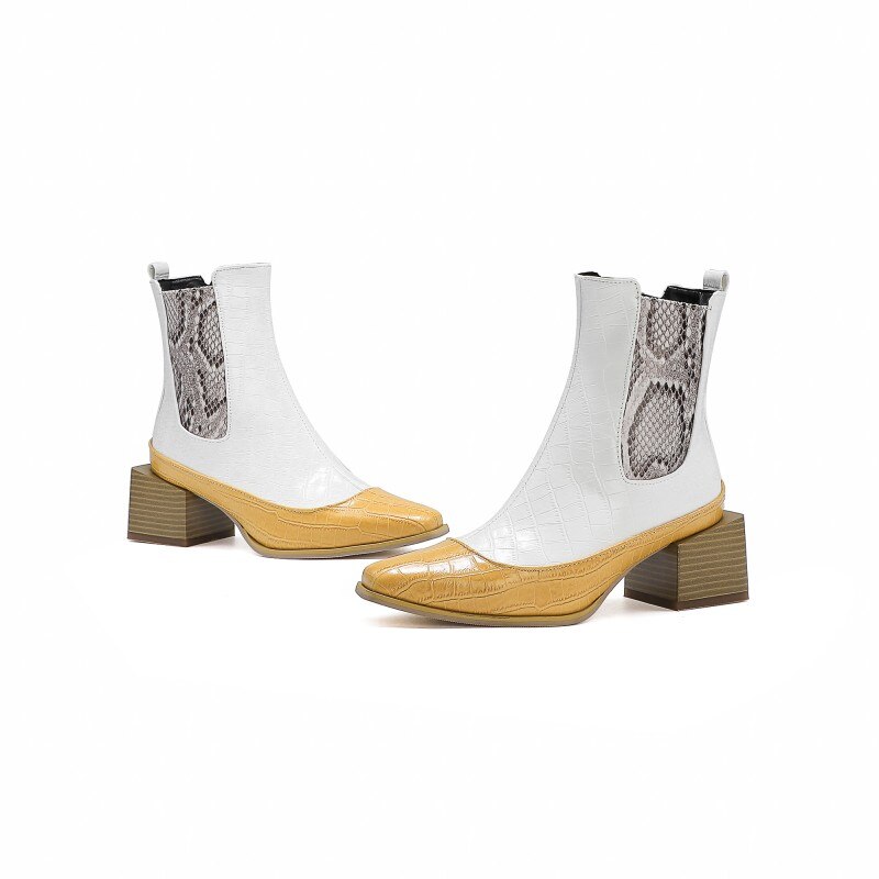 White and yellow leather ankle boots with embossed croc pattern, snakeskin elastic side panels, and square heels.