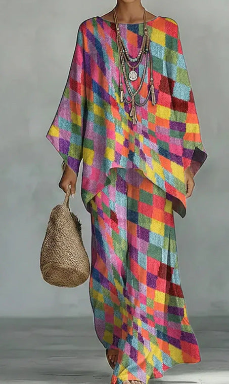 Women's loose bat sleeve top and wide-leg pants outfit by Plush Fashion Hub, featuring a relaxed fit and comfortable style.