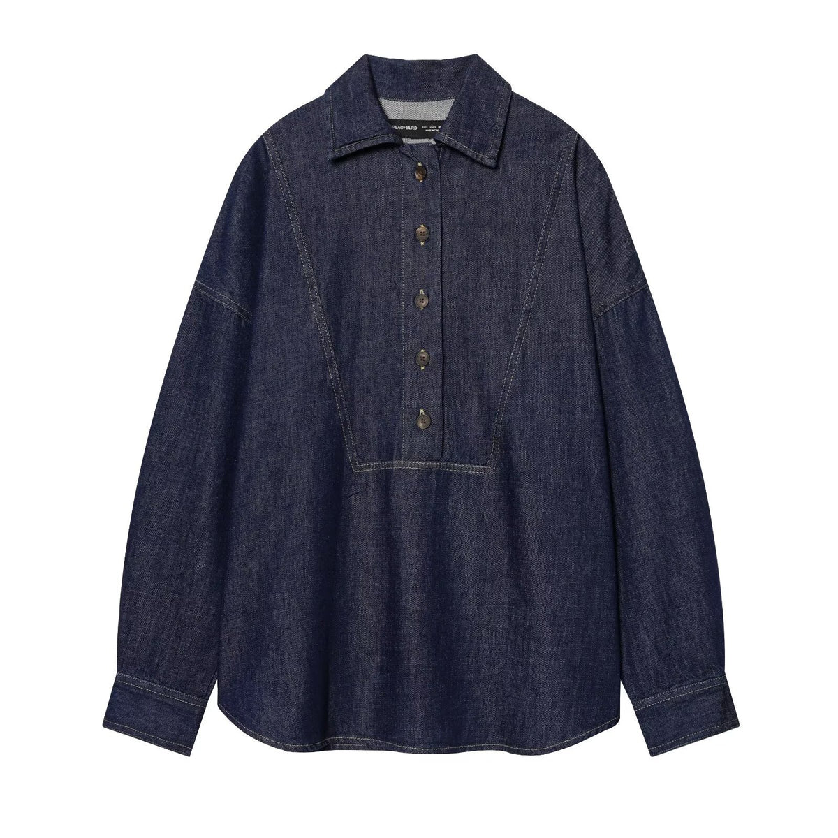 Dark blue denim long-sleeve shirt with a pointed collar, partial front button placket, and contrast topstitching.