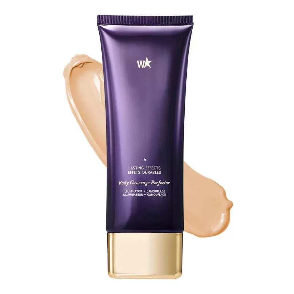 Shiny purple plastic tube of body coverage makeup with gold cap and swatch of beige cream behind it.