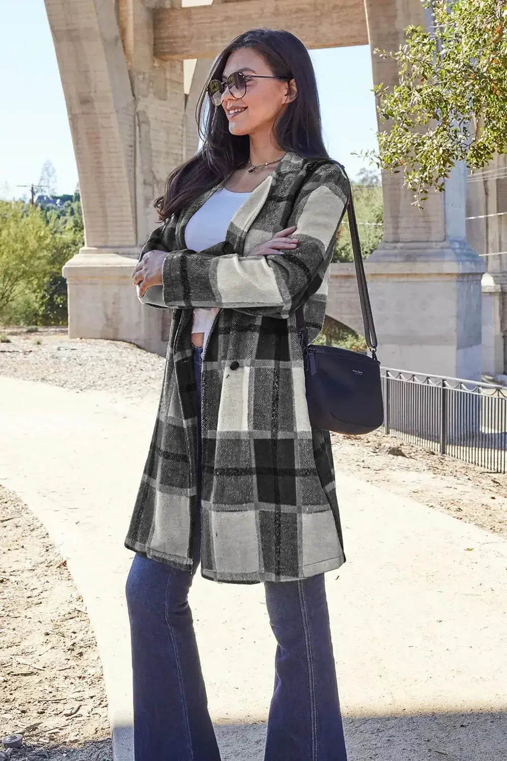 Women’s plaid button-up lapel coat by Plush Fashion Hub, wool-feel seasonal outerwear with classic plaid pattern and tailored design.