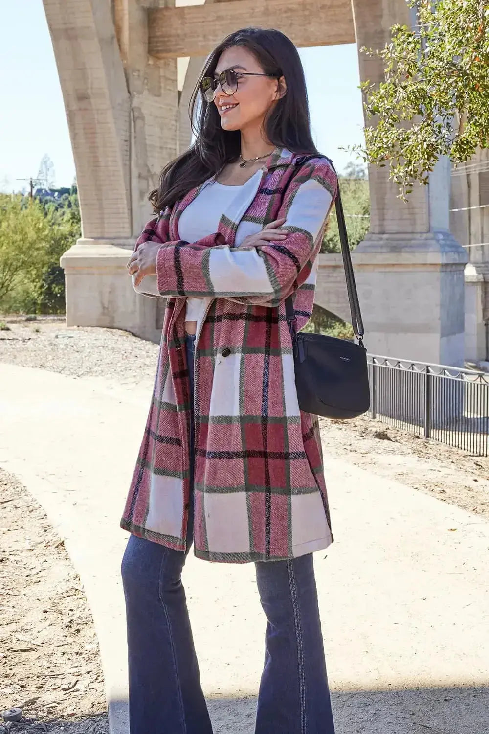 Women’s plaid button-up lapel coat by Plush Fashion Hub, wool-feel seasonal outerwear with classic plaid pattern and tailored design.
