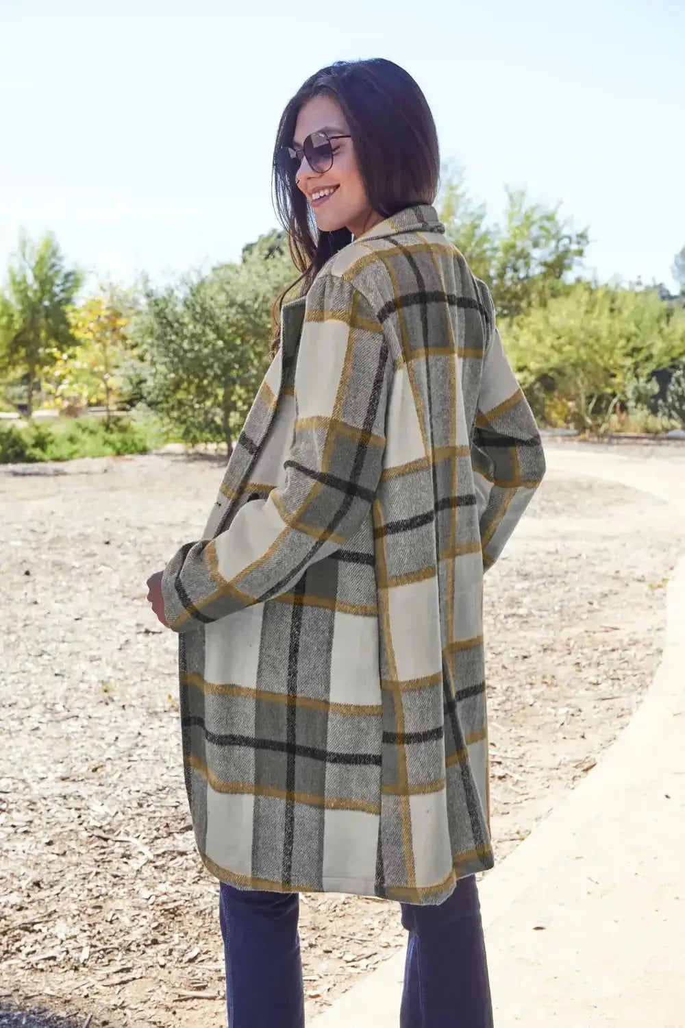 Women’s plaid button-up lapel coat with a wool-like texture, seasonal outerwear by Plush Fashion Hub.
