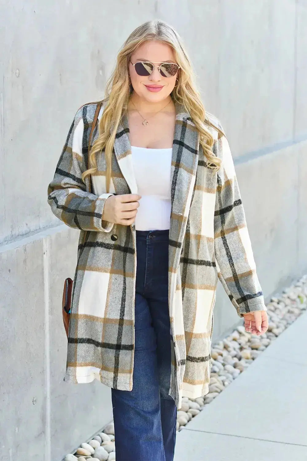 Women’s plaid button-up lapel coat by Plush Fashion Hub, seasonal wool-feel outerwear with classic plaid pattern and tailored fit.