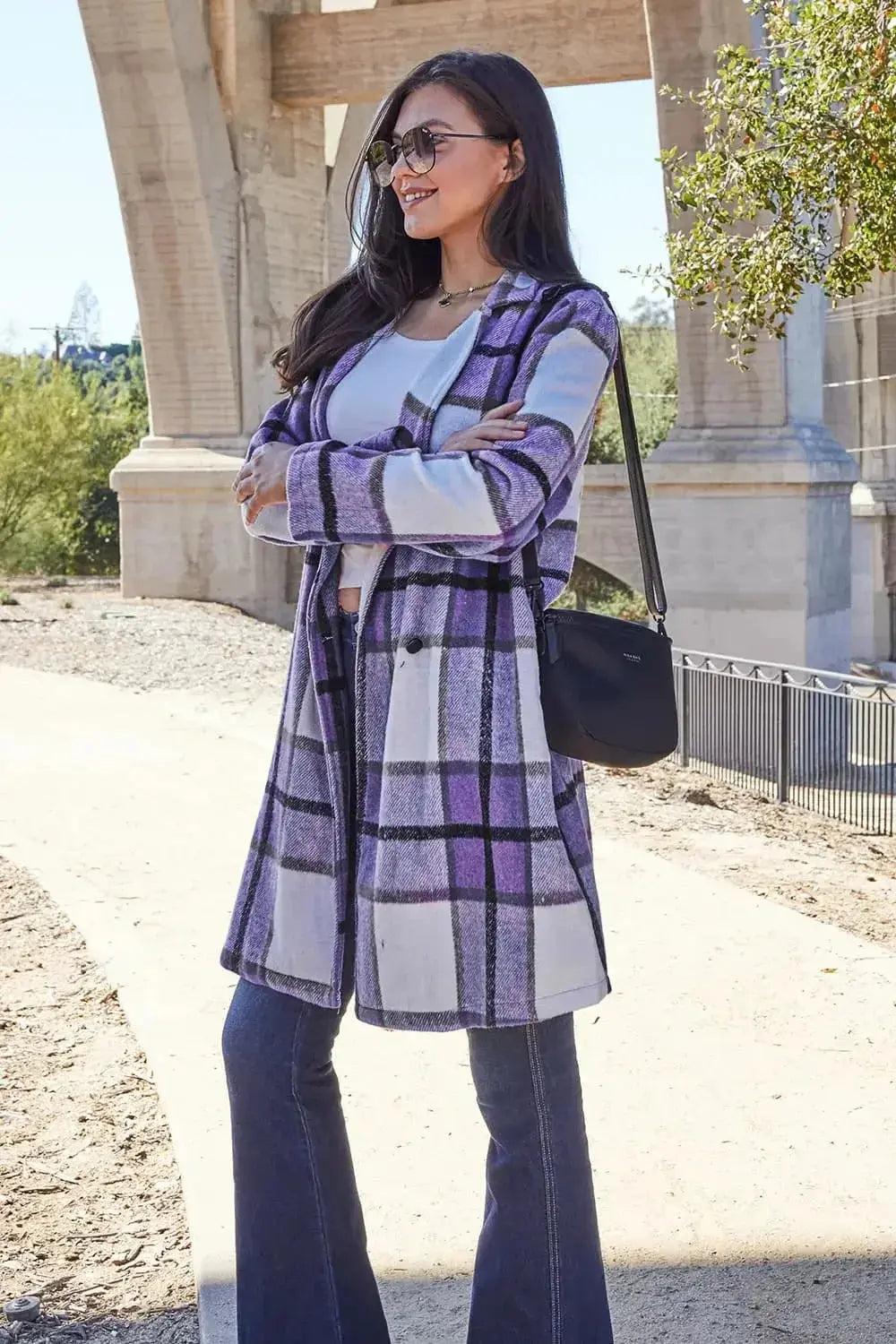 Women's plaid button-up lapel coat by Plush Fashion Hub, wool-feel seasonal outerwear with classic plaid pattern and tailored design.
