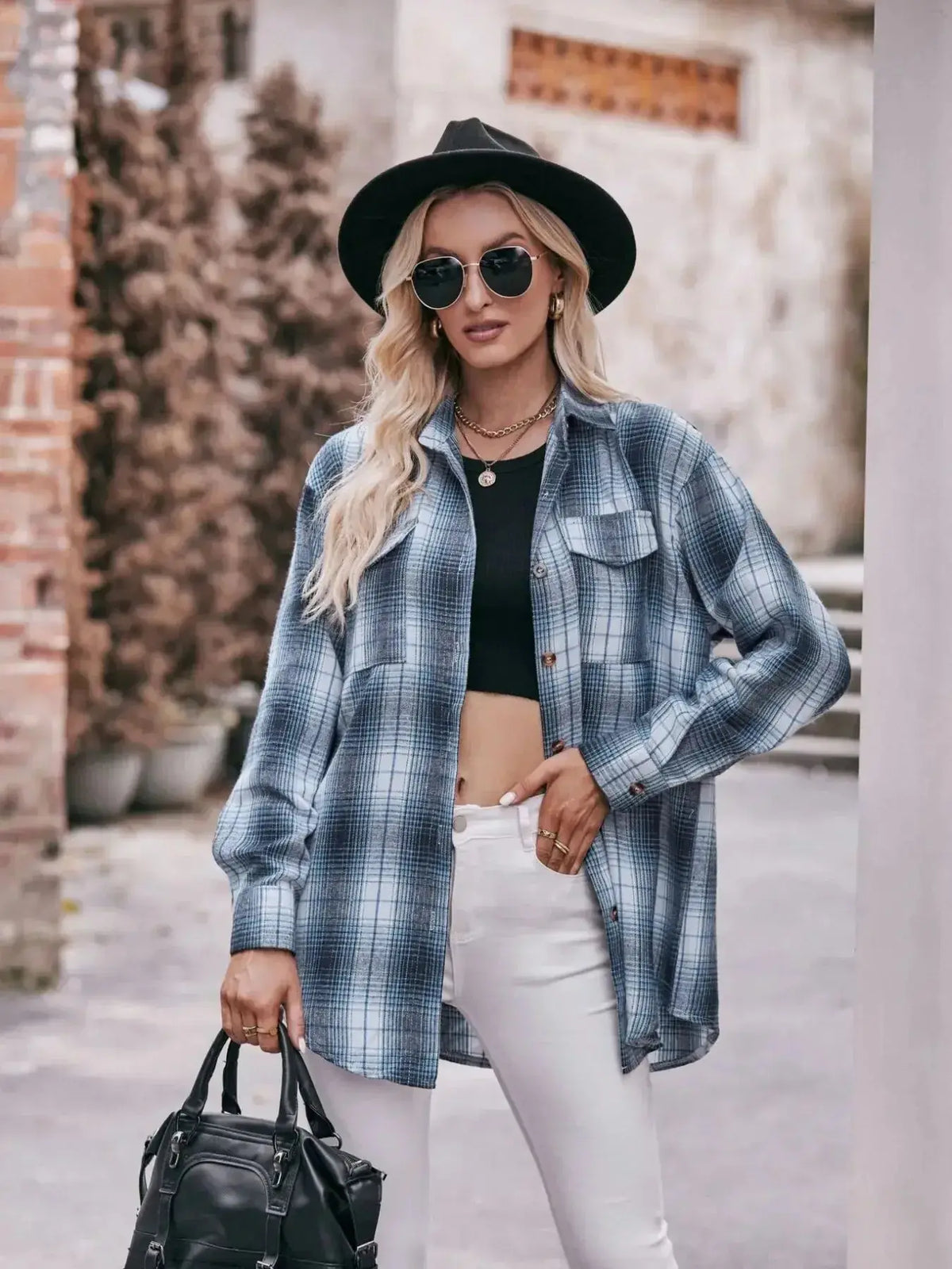 Plaid long sleeve button-down shirt for women by Plush Fashion Hub, featuring classic pattern and casual fit.