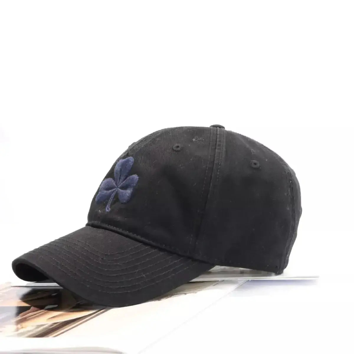 Clover embroidered 100% cotton baseball cap from Plush Fashion Hub, breathable casual hat with a relaxed fit and stylish design.