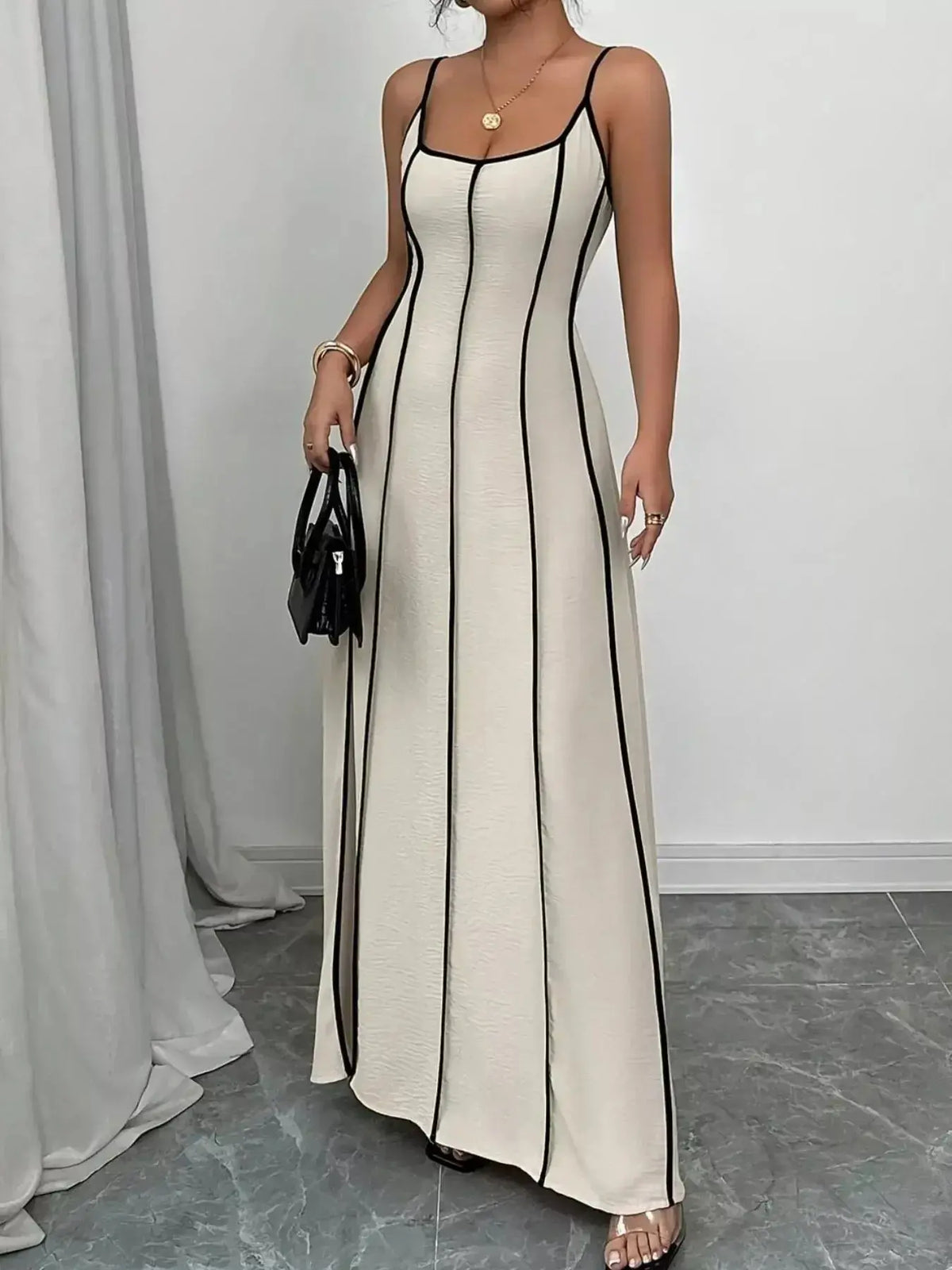 Contrast trim spaghetti strap ruched maxi dress by Plush Fashion Hub, flowy summer evening gown with elegant design.