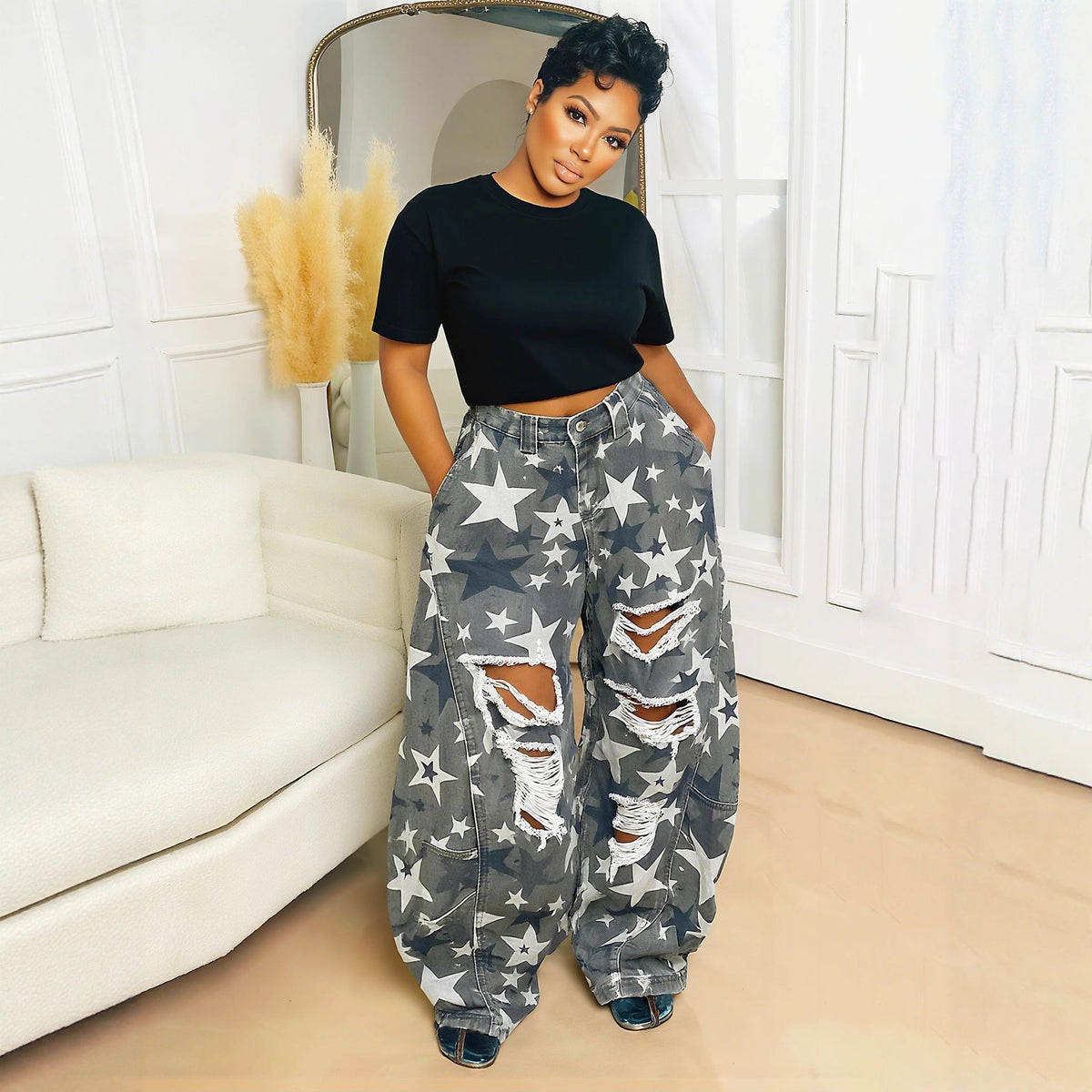 Distressed camo star print boyfriend jeans by Plush Fashion Hub, showing relaxed fit denim with ripped details and star patterns.