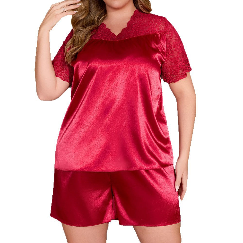 Plus-size red satin pajama set with short lace sleeves and V-neck.