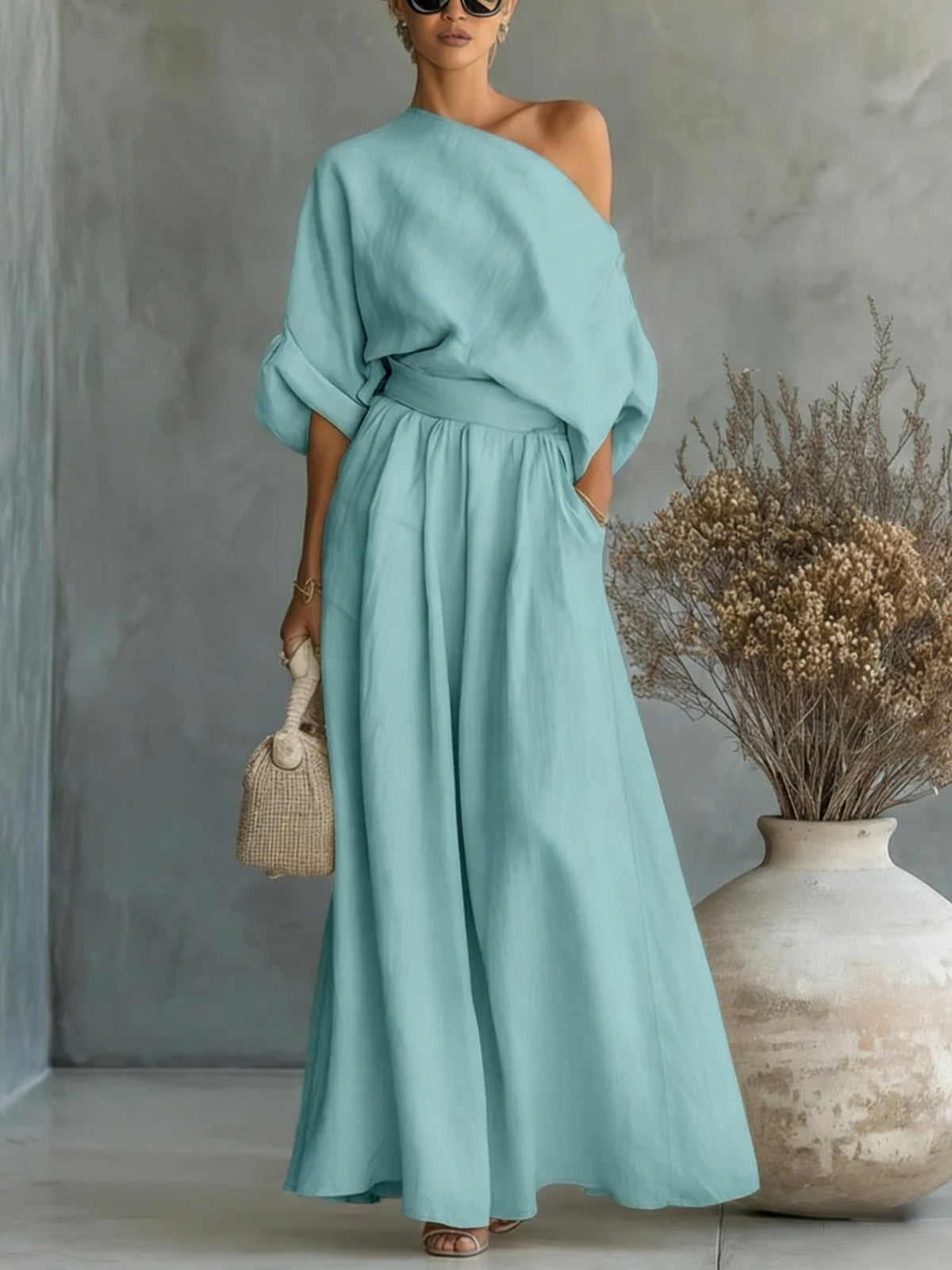 Elegant fitted asymmetrical shoulder top and matching pants two-piece outfit by Plush Fashion Hub, stylish and modern ensemble.
