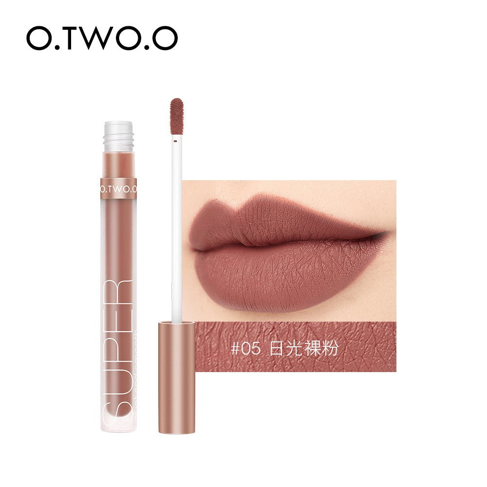O.TWO.O matte liquid lipstick in shade #05, featuring a mauve-pink shade and applicator.