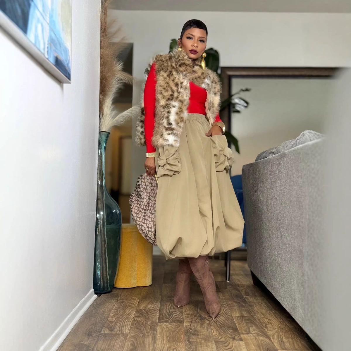 Reversible thick leopard print fur vest by eprolo featuring plush fur on both sides and a stylish, bold animal print design.
