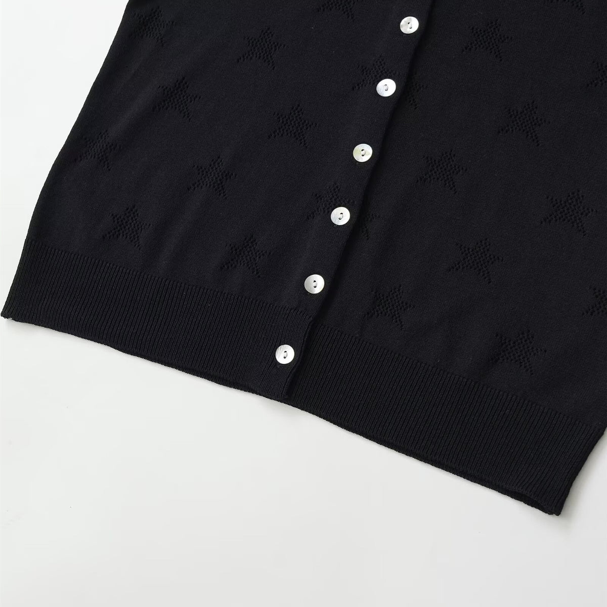 Eprolo round neck star hollow short-sleeved knitted jacket showcasing star pattern and lightweight knit fabric.