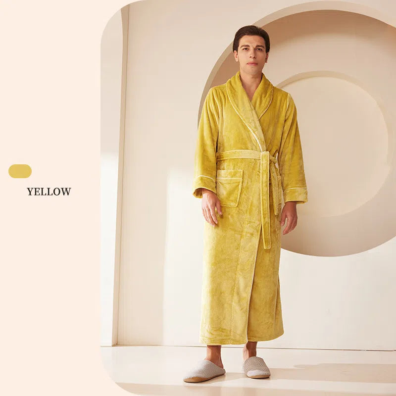 A solid yellow plush fleece bathrobe with a shawl collar, matching tie belt, and white trim.