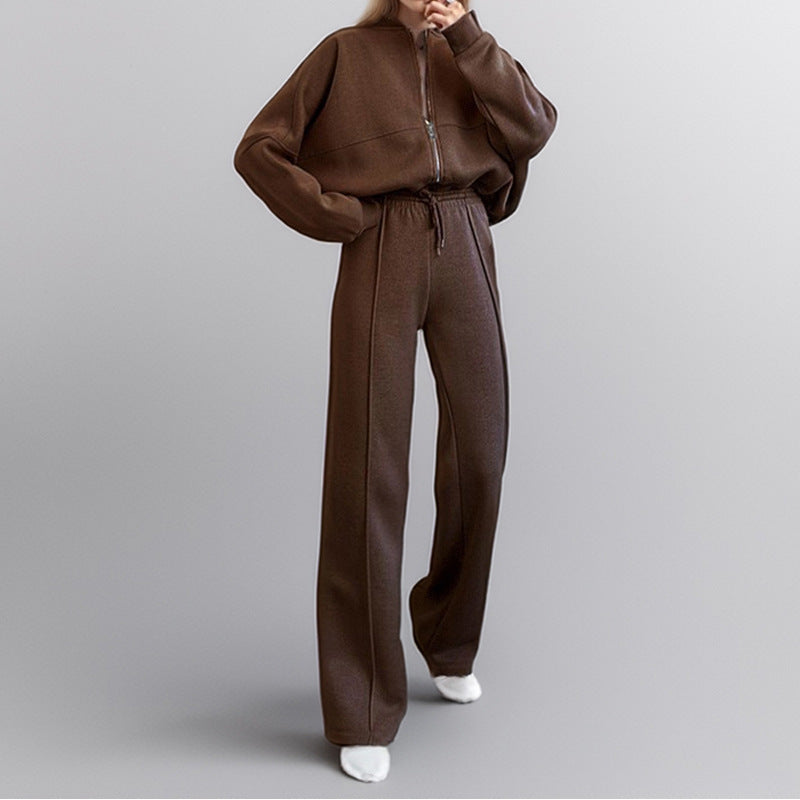 Plush Fashion Hub relaxed tie-waist lounge pants made of soft plush fabric, displayed in a cozy, casual setting.