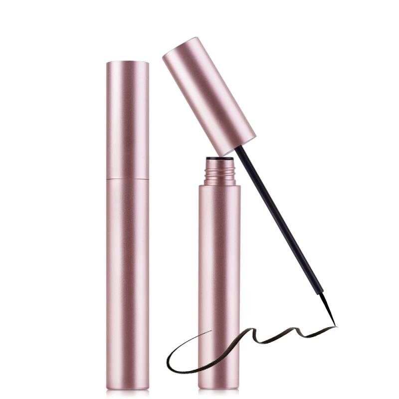 Two metallic pink liquid eyeliner tubes, one open with a fine-tipped brush showing a black stroke.
