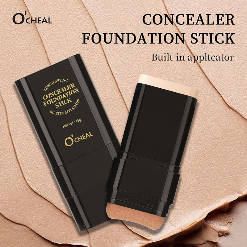 Black O'Cheal concealer stick with gold text, open to reveal beige foundation and a built-in makeup brush.