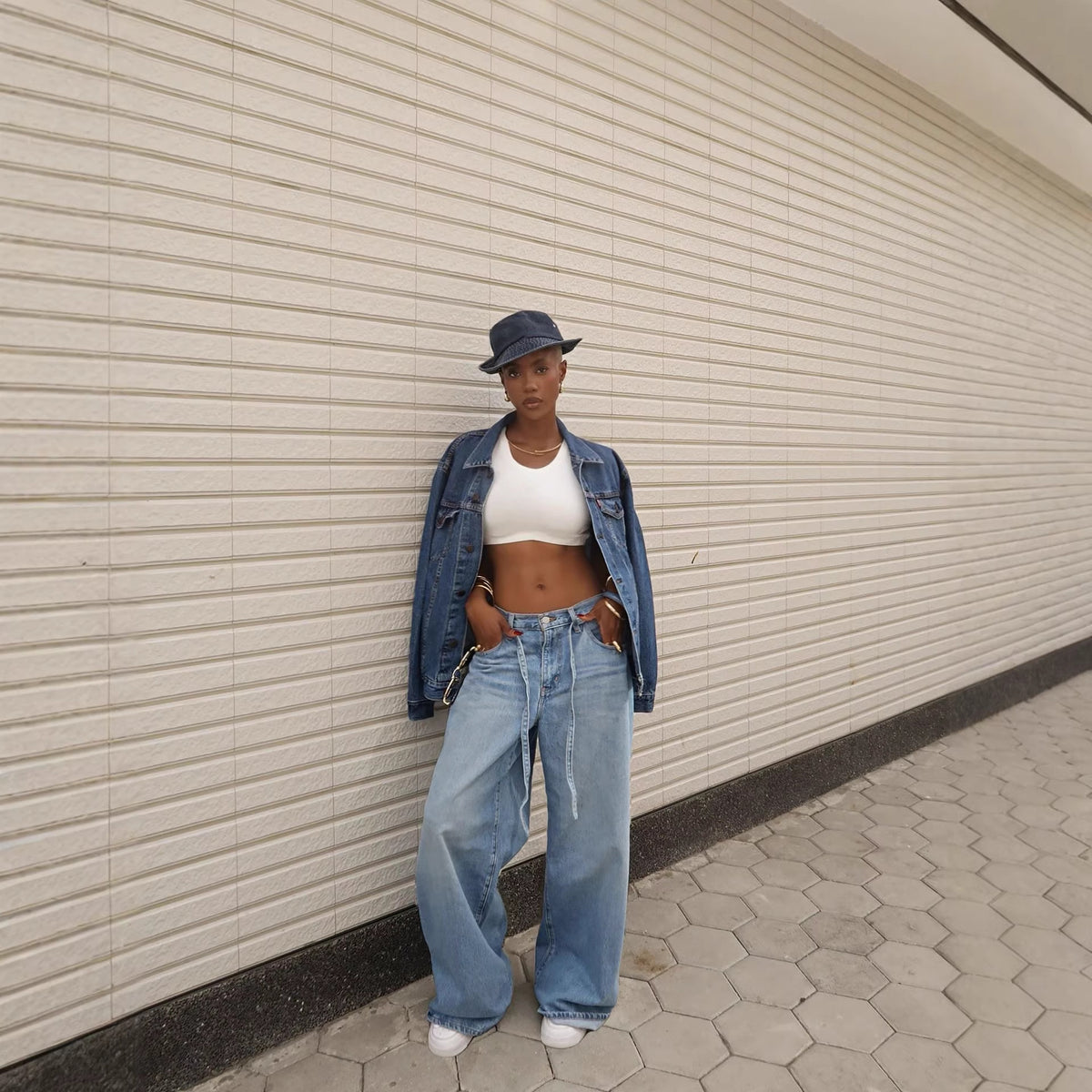 Washed denim high-waisted straight-leg jeans with tie waist detail from Plush Fashion Hub, displayed on a neutral background.