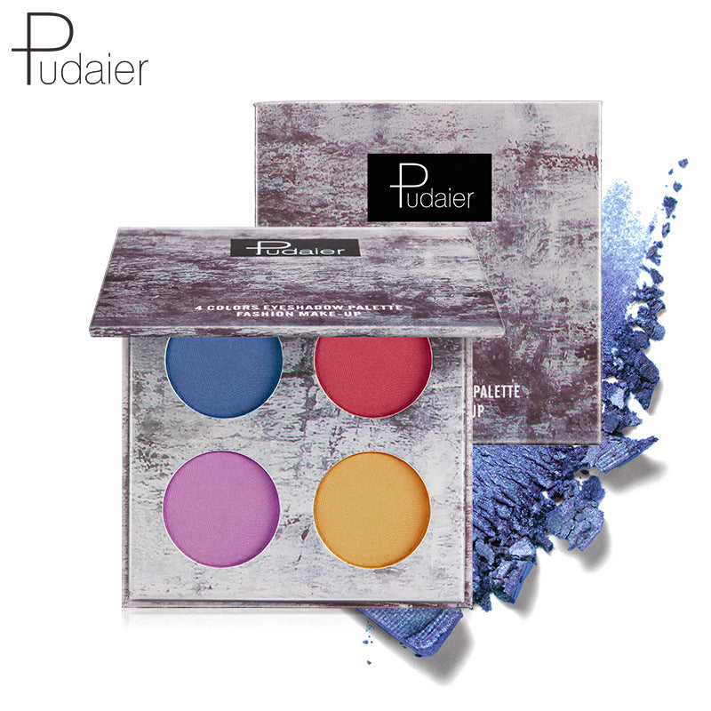 Pudaier 4-color eyeshadow palette with distressed purple packaging, blue, red, purple, and gold shades.