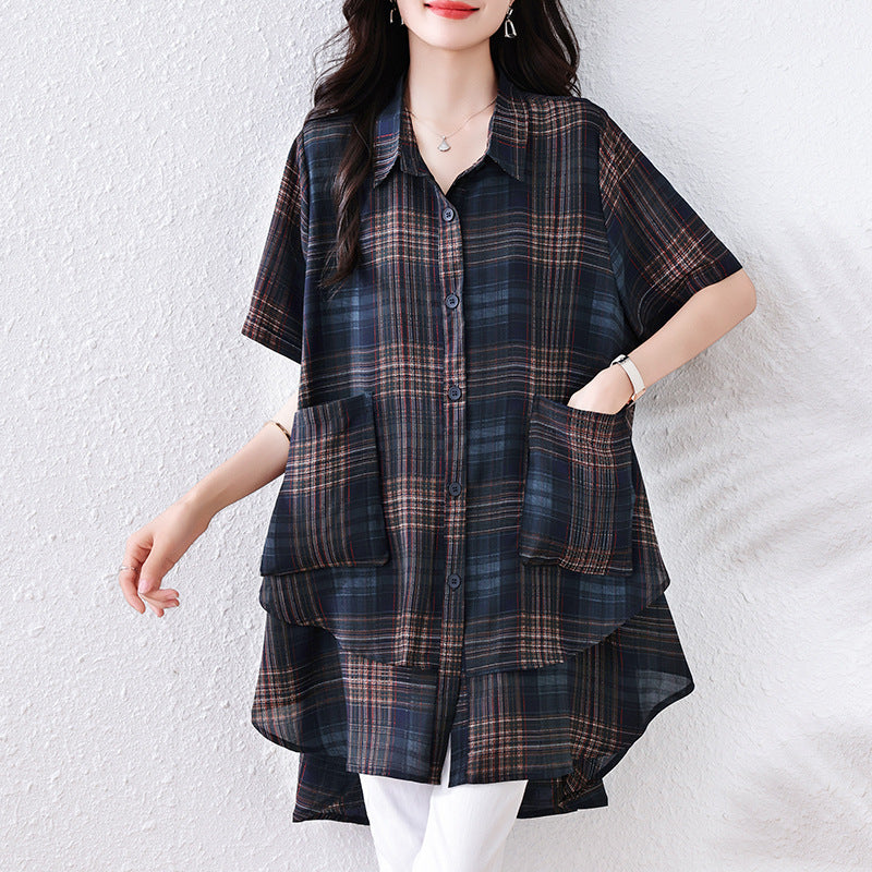 Dark plaid short-sleeve button-down shirt with dual front pockets, layered high-low hem, and collar.