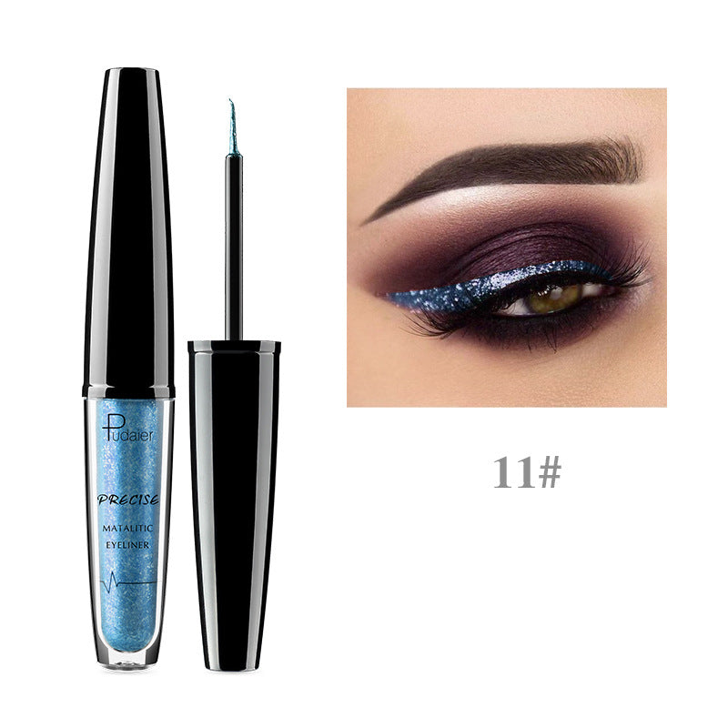 Blue glitter liquid eyeliner tube with black cap next to an eye with matching liner and dark eyeshadow.