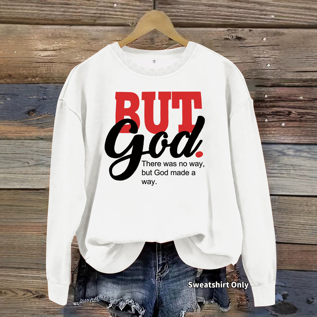 White crewneck sweatshirt with red and black graphic text reading "But God There was no way, but God made a way."