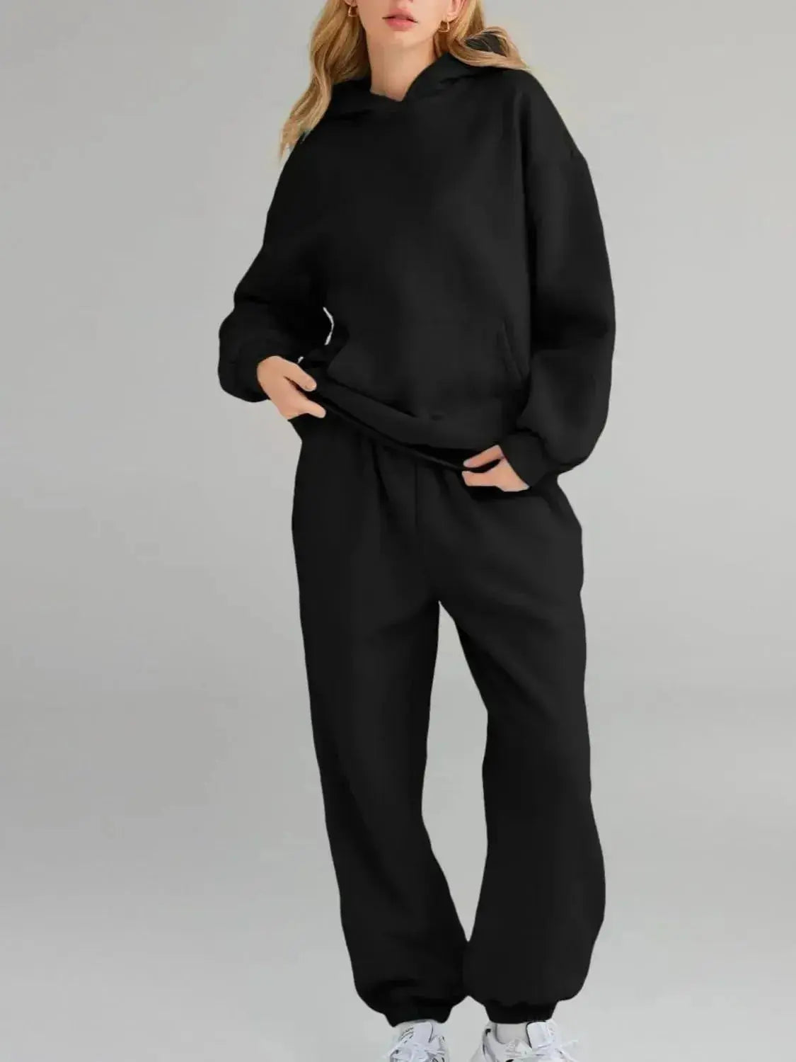 Plus size women's hoodie and jogger sweat suit with kangaroo pocket from Plush Fashion Hub, casual loungewear set