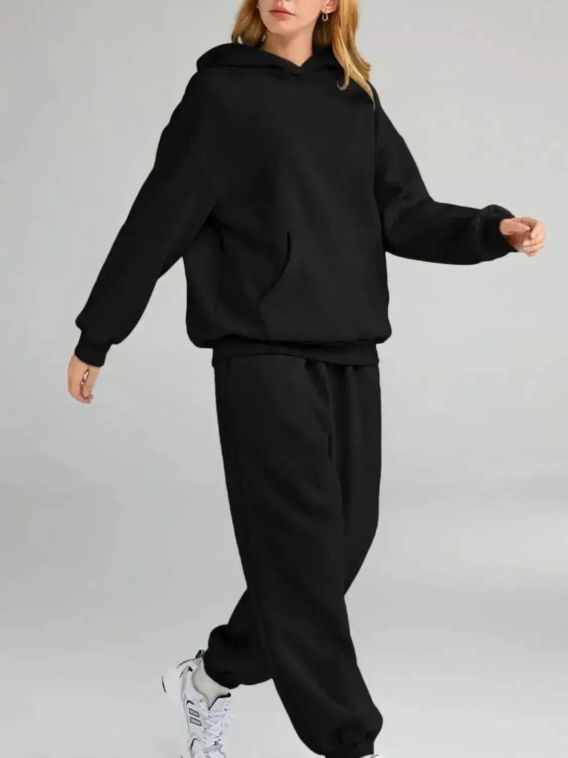 Plus size women's hoodie and jogger sweat suit with kangaroo pocket, from Plush Fashion Hub, shown in full view.