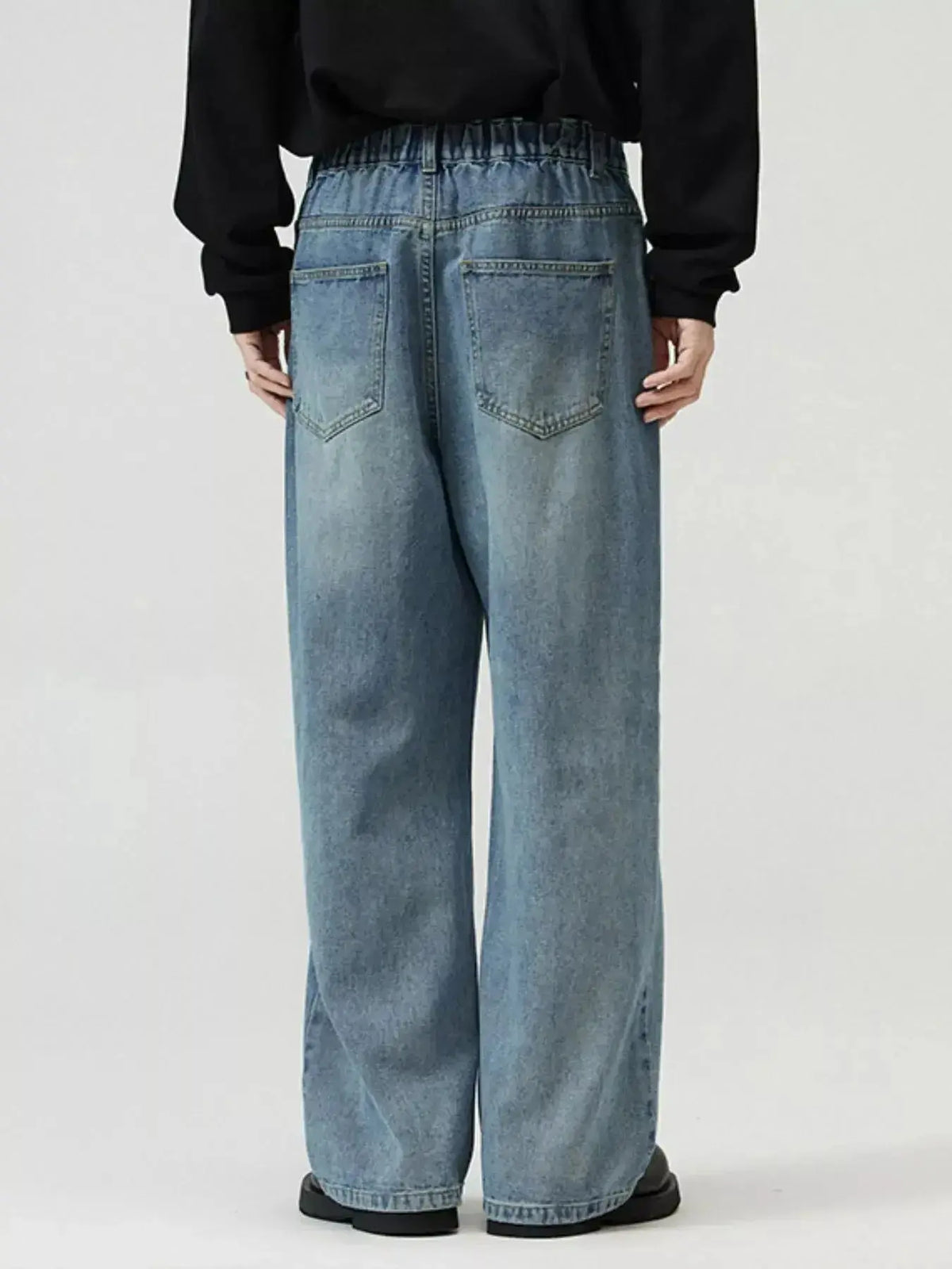 Men's washed straight-leg stretch jeans by Plush Fashion Hub, showing a comfortable fit and classic denim style.