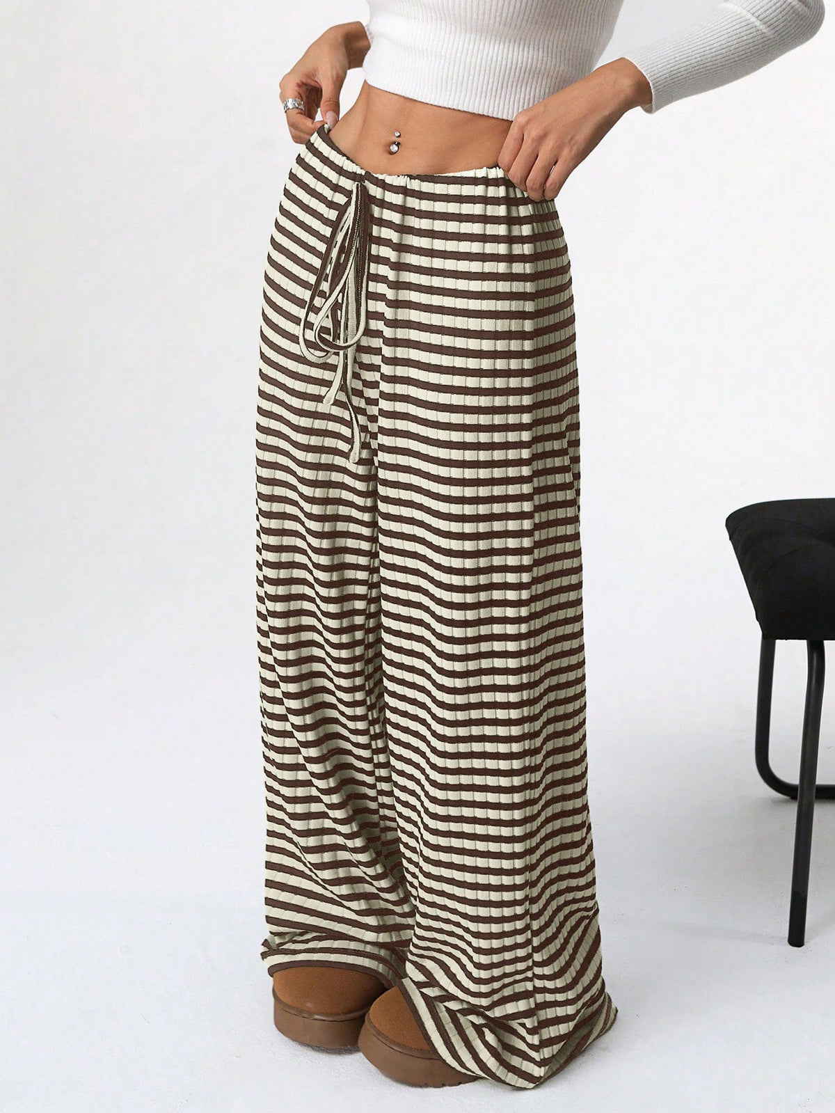 Casual women's striped solid color pants by Plush Fashion Hub with rubber band waist and straight-leg design for autumn and winter wear.
