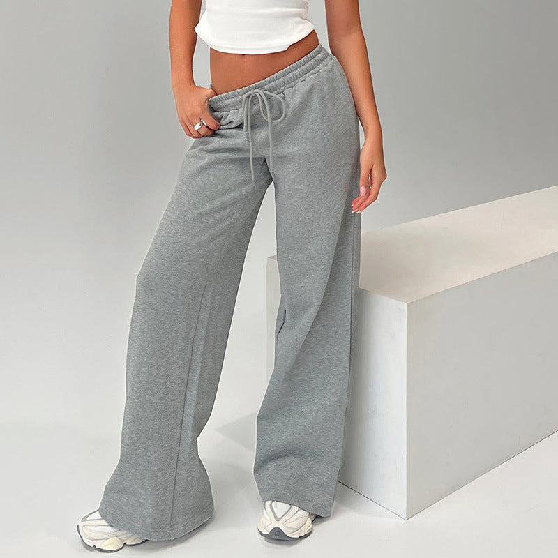 Women’s casual loose-fit trousers with drawstring waist in solid color, from Plush Fashion Hub, perfect for autumn wear.