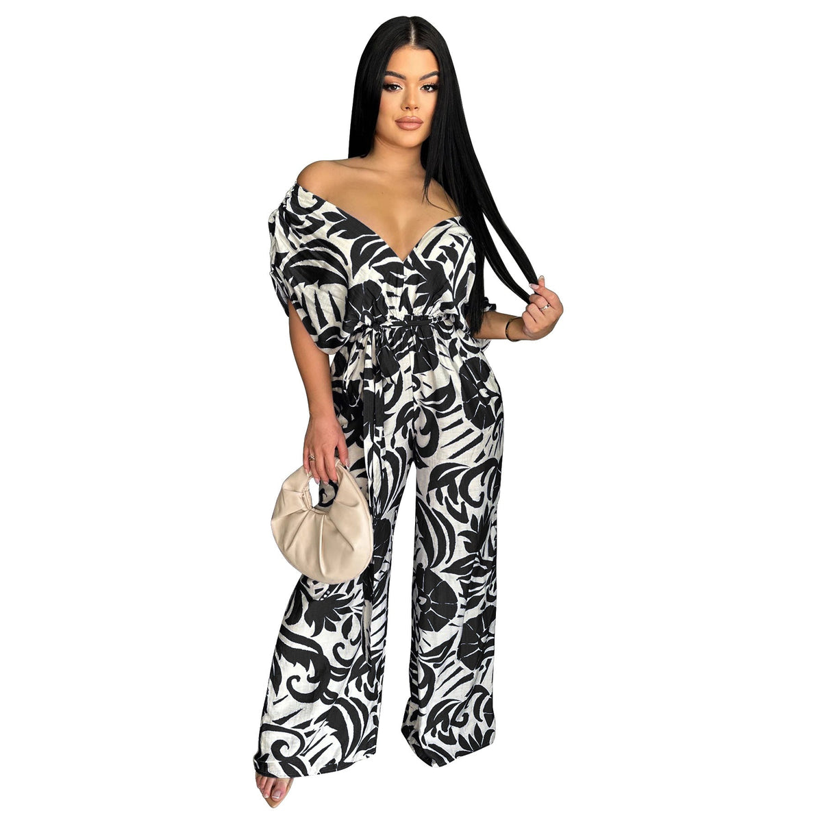 Women’s printed off-shoulder jumpsuit with batwing sleeves and wide-leg design by Plush Fashion Hub.