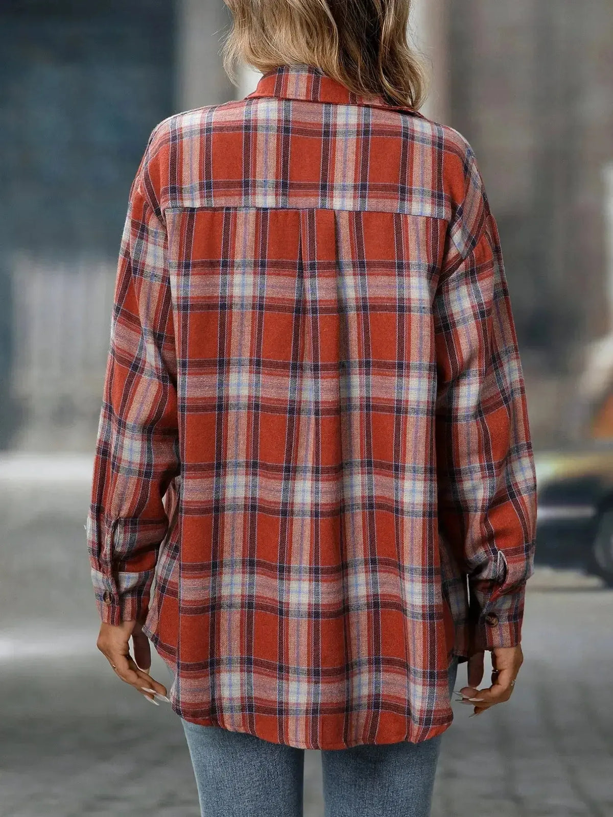 Oversized plaid flannel button-down shirt for women by Plush Fashion Hub, featuring a soft, casual, and trendy design.