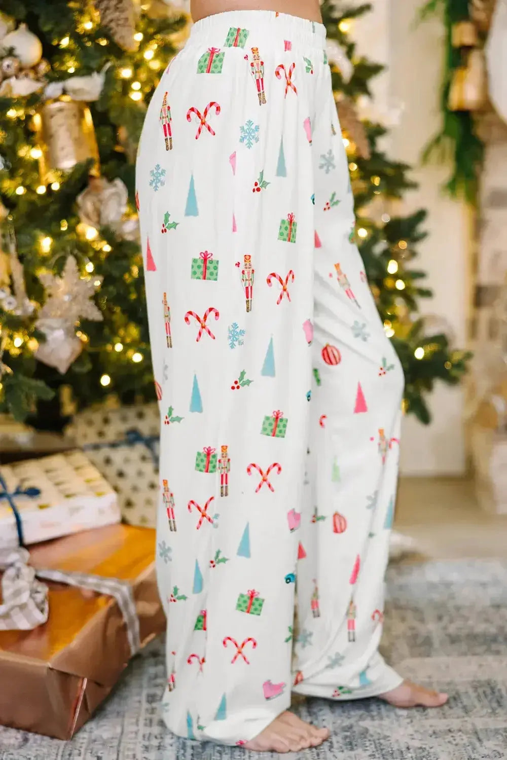 Women’s Christmas print long sleeve collared pajama lounge set by Plush Fashion Hub, featuring festive holiday patterns and comfortable fabric.