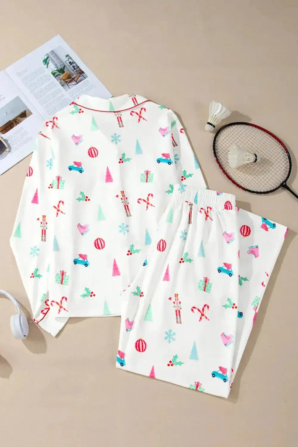Women’s Christmas print long sleeve collared pajama lounge set by Plush Fashion Hub, featuring festive holiday-themed fabric and cozy design.