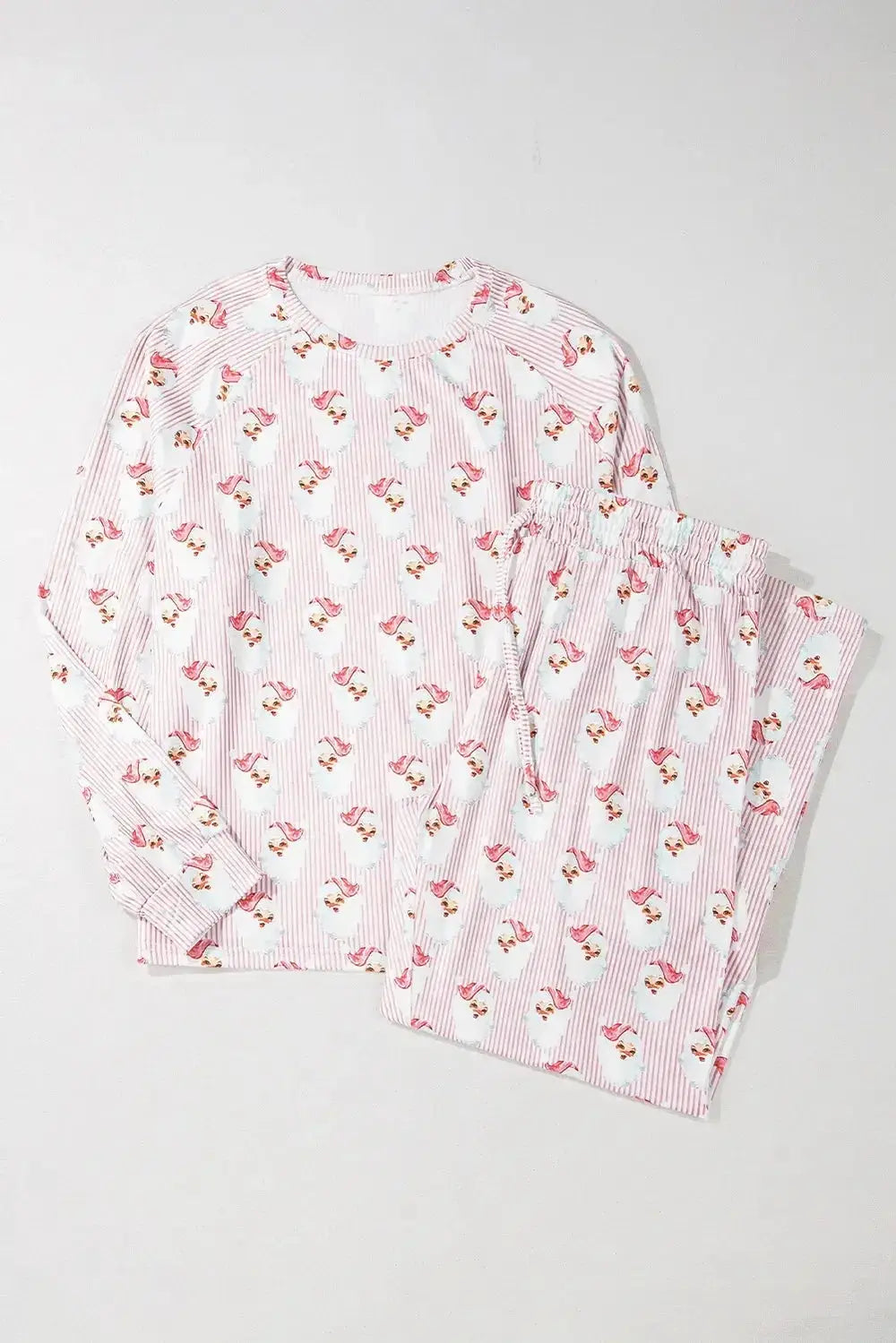 Women’s festive Santa print long sleeve pajama lounge set by Plush Fashion Hub, featuring cozy holiday-themed sleepwear.
