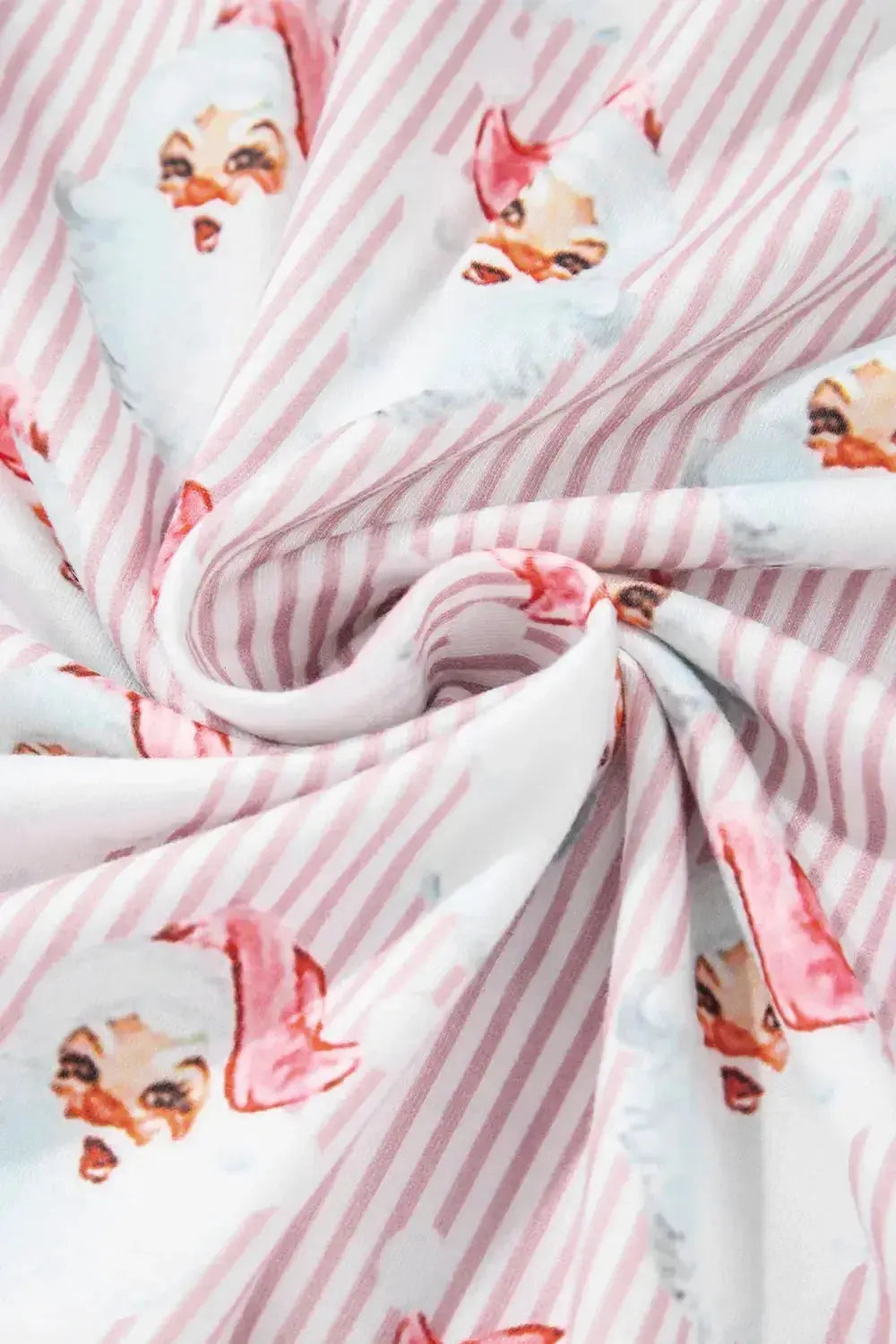 Women’s festive Santa print long sleeve pajama lounge set by Plush Fashion Hub, featuring cozy holiday-themed pajamas.